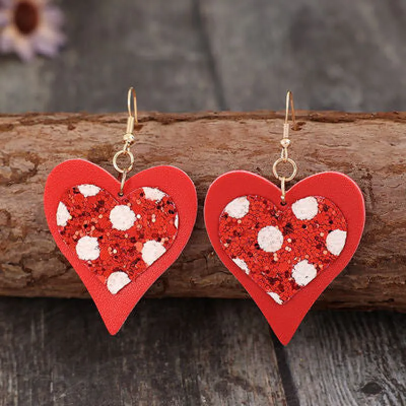 Sequin Heart Leather Drop Earrings sold by Charming Charlie