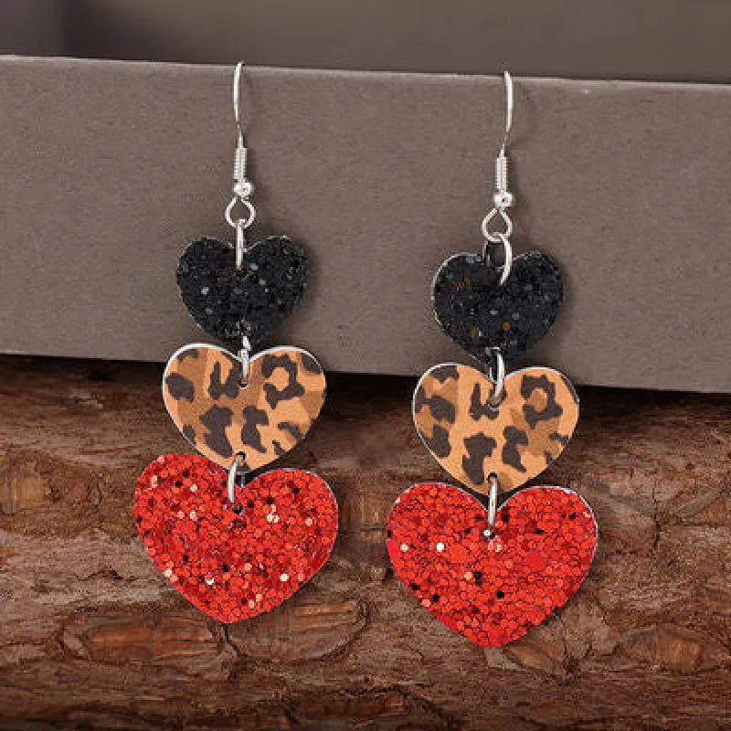 Heart Leather Drop Earrings sold by Charming Charlie