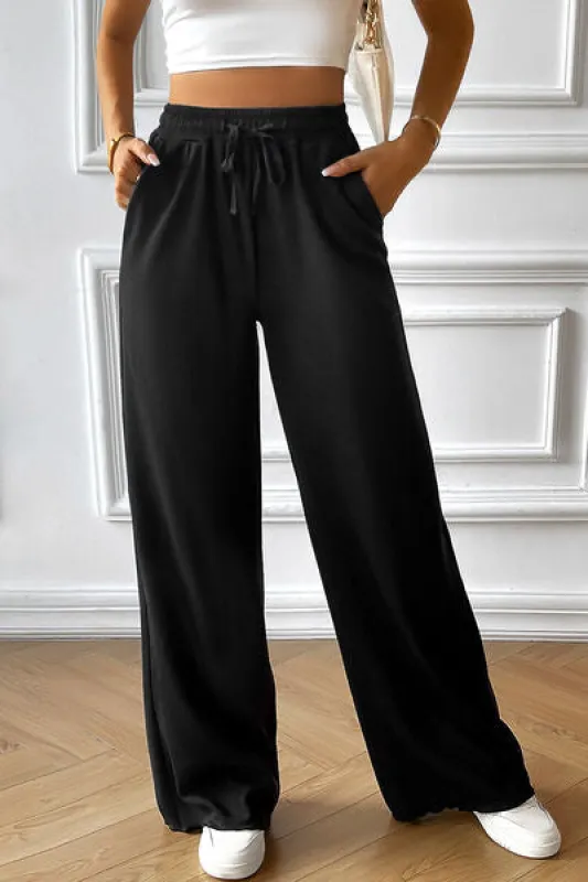 Drawstring Wide Leg Pants with Pocketed sold by Charming Charlie