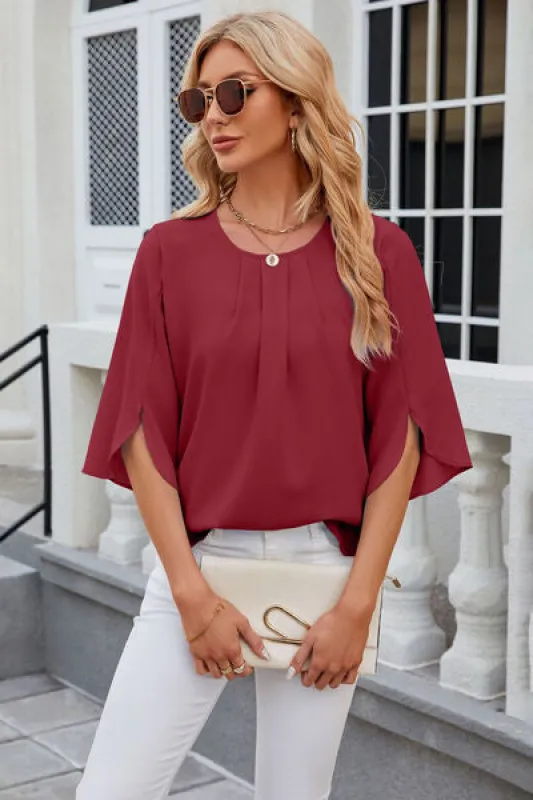Round Neck Slit Half Sleeve Top sold by Charming Charlie