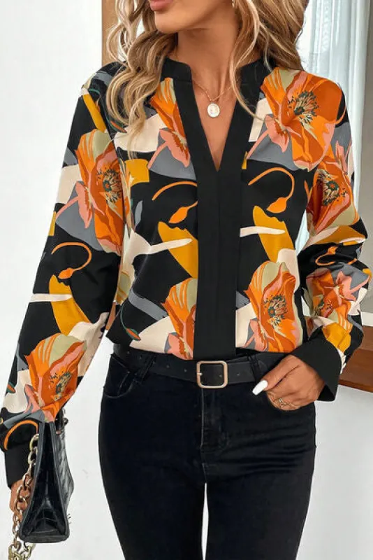 Floral Notched Long Sleeve Blouse sold by Charming Charlie