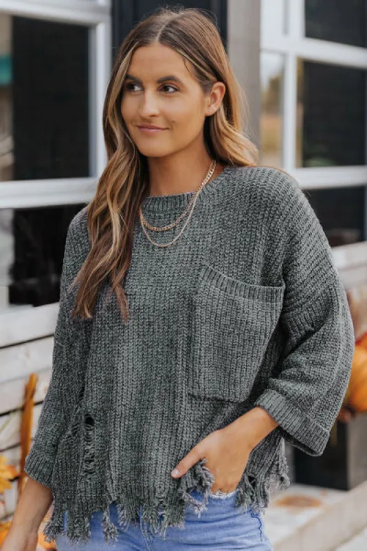 Distressed Pocketed Raw Hem Sweater sold by Charming Charlie