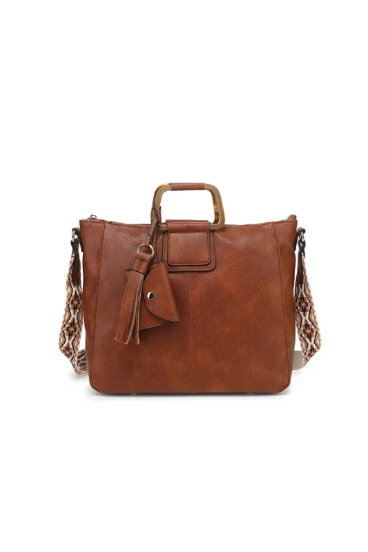 RING HANDLE SATCHEL WITH GUITAR STRAP sold by Charming Charlie