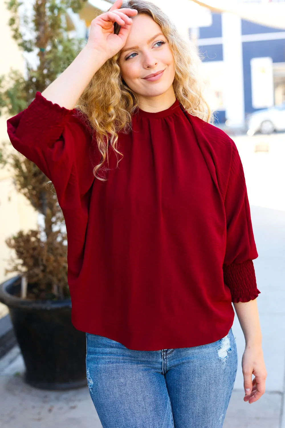 Bold Dreams Wine Smocked Three Quarter Sleeve Tie Back Top sold by Charming Charlie product image thumbnail 3