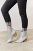 East Lion Corp Rhinestone Ankle Cowboy Boots sold by Charming Charlie