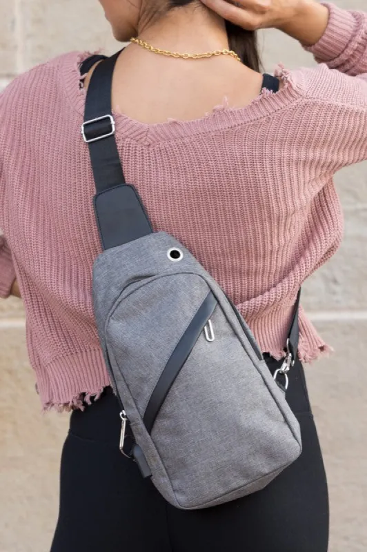 Cross Zip Sling Bag sold by Charming Charlie