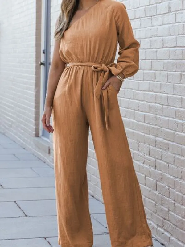 Texture Single Shoulder Tie-Waist Jumpsuit sold by Charming Charlie