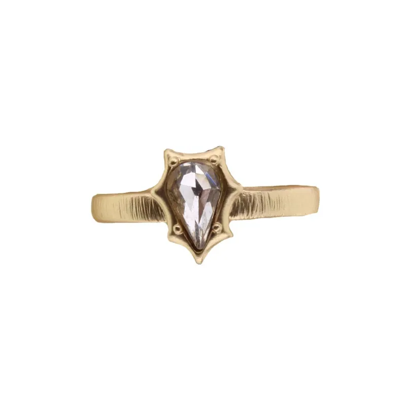 Gold Band with Clear Teardrop Crystal and Raised Edges Ring sold by Charming Charlie