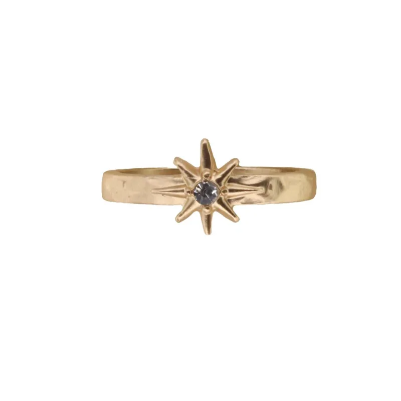 Gold Band with Gold Starburst Embelished with Clear Crystal Ring sold by Charming Charlie