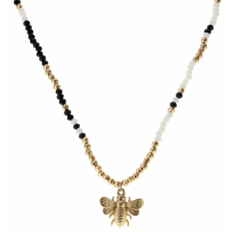 16" Jet, Gold, and White Body with Gold Bee Charm Necklace, 3" Ext. sold by Charming Charlie