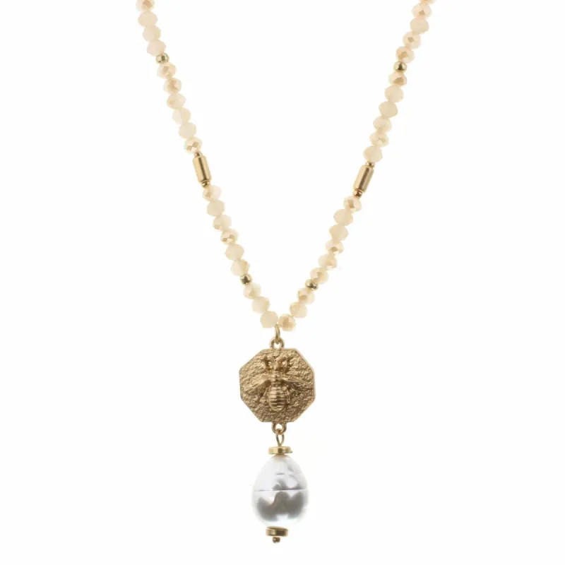 30" Hexagon Bee with Pearl Drop on Rose Body Necklace, 2" Ext. sold by Charming Charlie