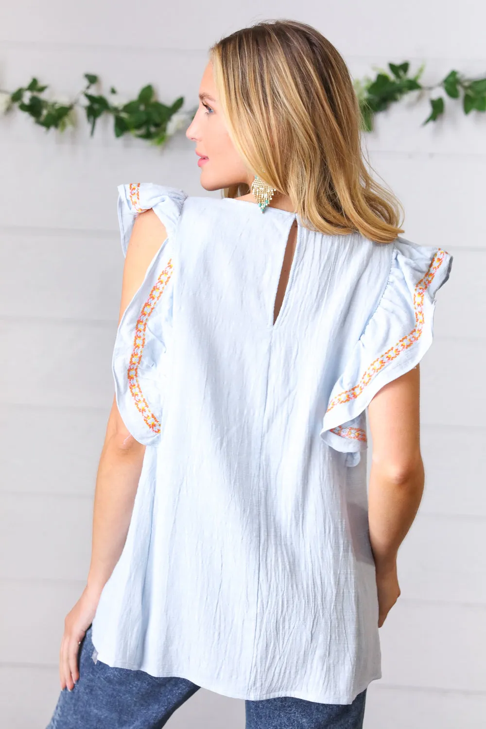 Chambray Embroidered Flutter Sleeve Top sold by Charming Charlie product image thumbnail 4