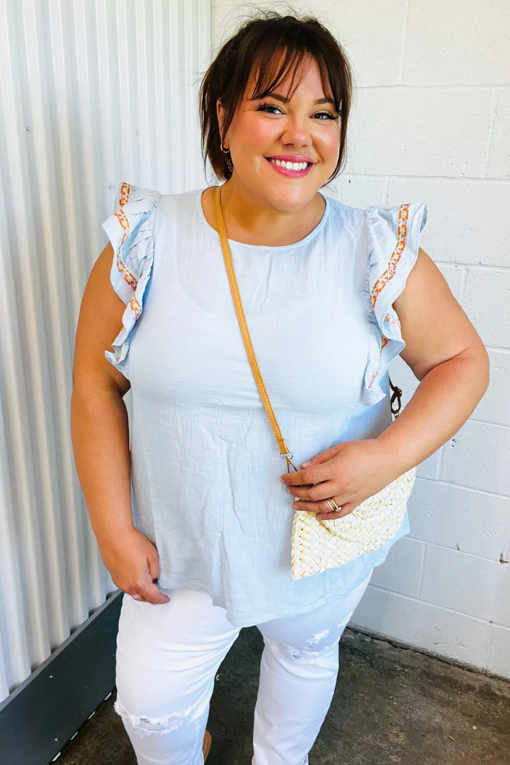 Chambray Embroidered Flutter Sleeve Top sold by Charming Charlie