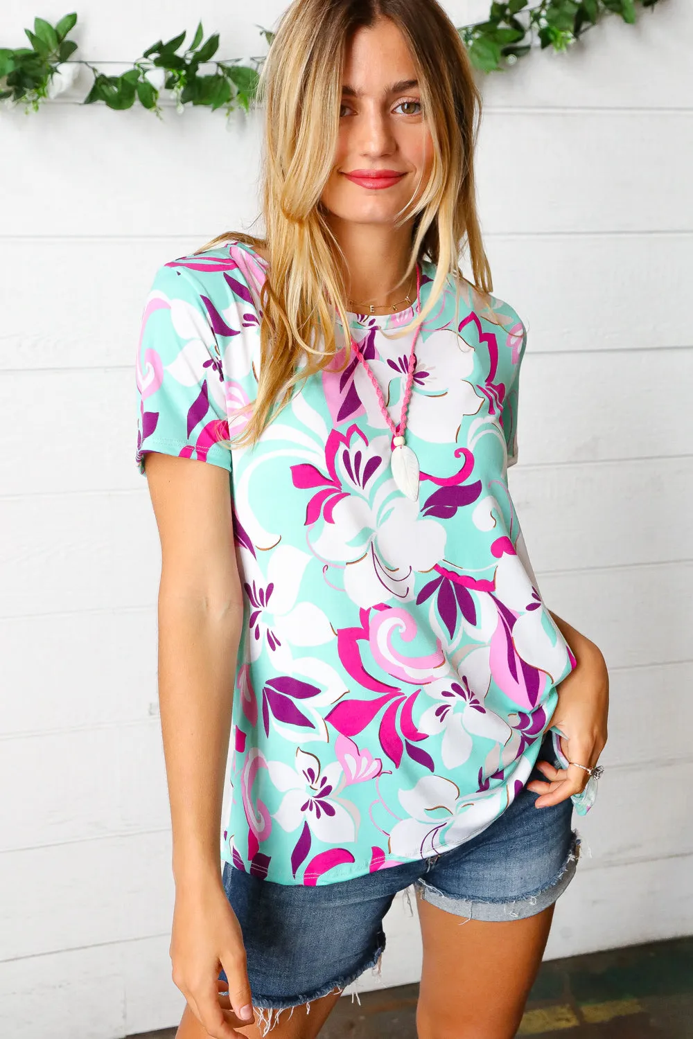 Turquoise & Purple Flat Floral Print Top sold by Charming Charlie