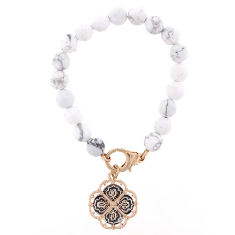 Howlite Stretch Bracelet with Double Sided "Matthew 5:14" Charm sold by Charming Charlie