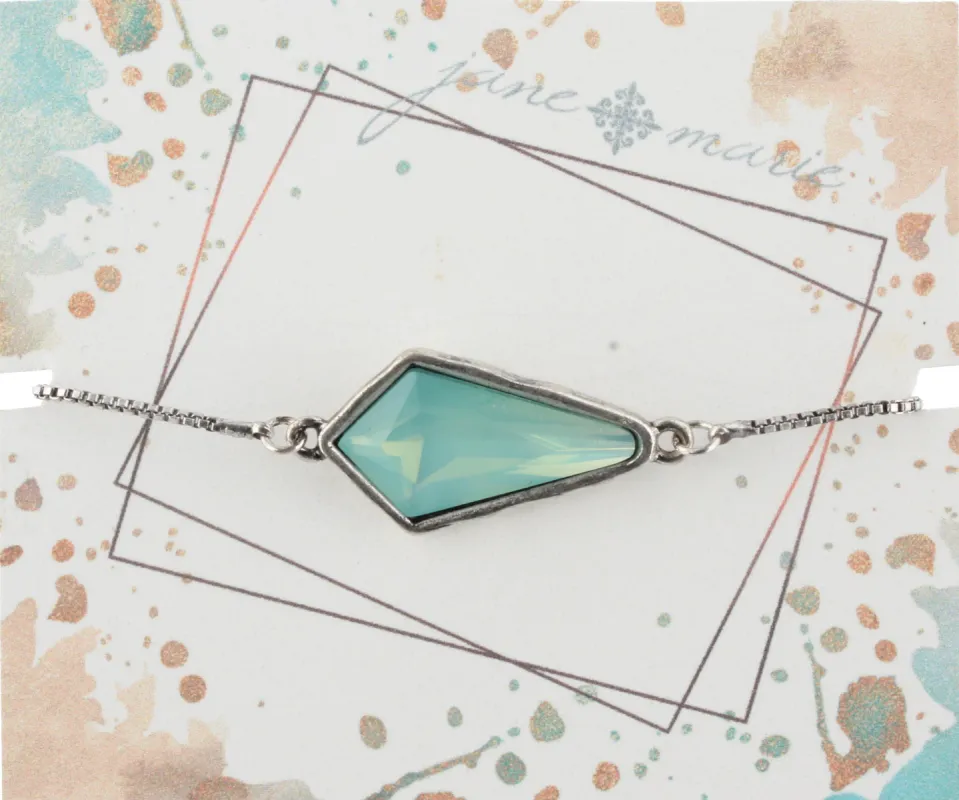 Silver Adjustable Chain Bracelet with Light Aqua Pointed Teardrop Rhinestone sold by Charming Charlie