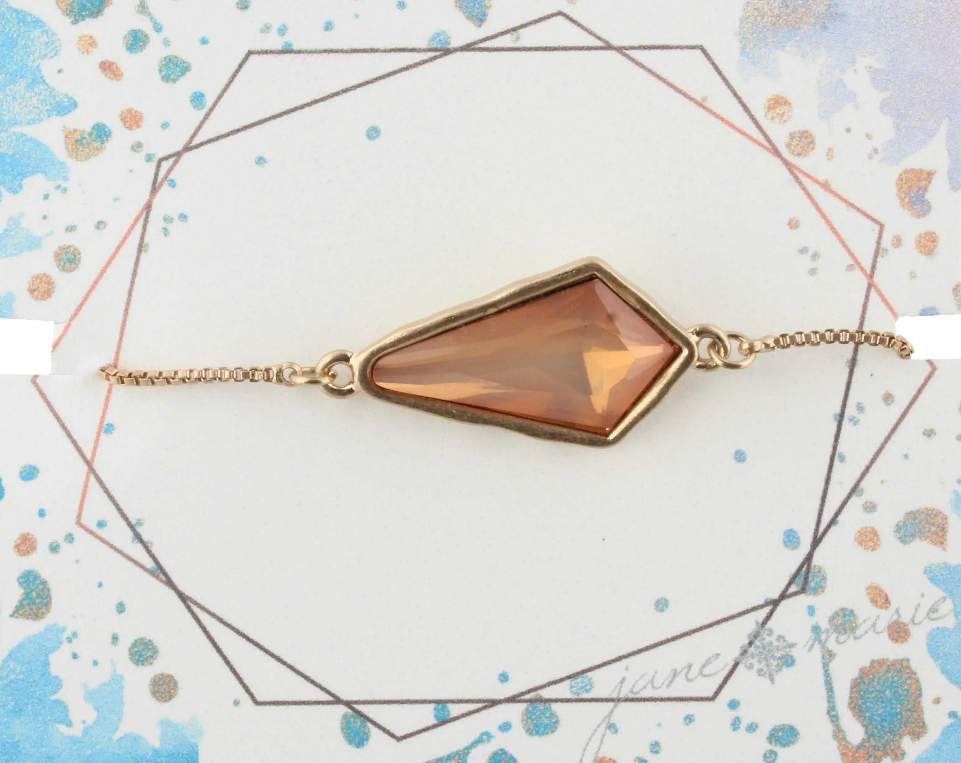 Gold Adjustable Chain Bracelet with Peach Pointed Teardrop Rhinestone sold by Charming Charlie