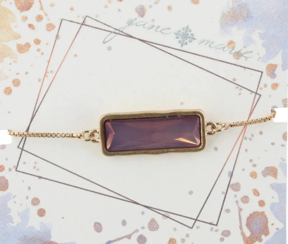 Gold Adjustable Chain Bracelet with Purple Rectangle Rhinestone sold by Charming Charlie