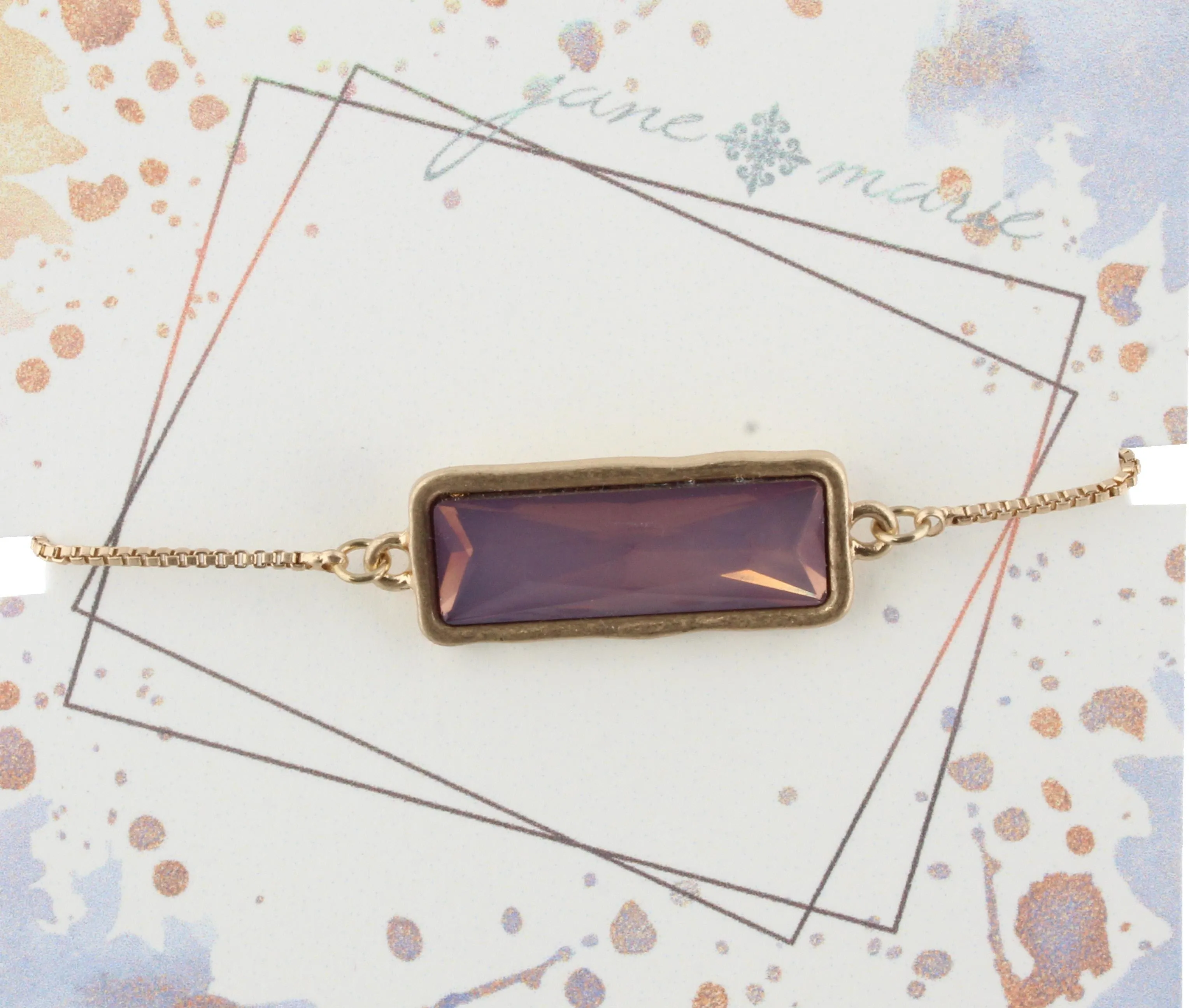 Gold Adjustable Chain Bracelet with Purple Rectangle Rhinestone sold by Charming Charlie