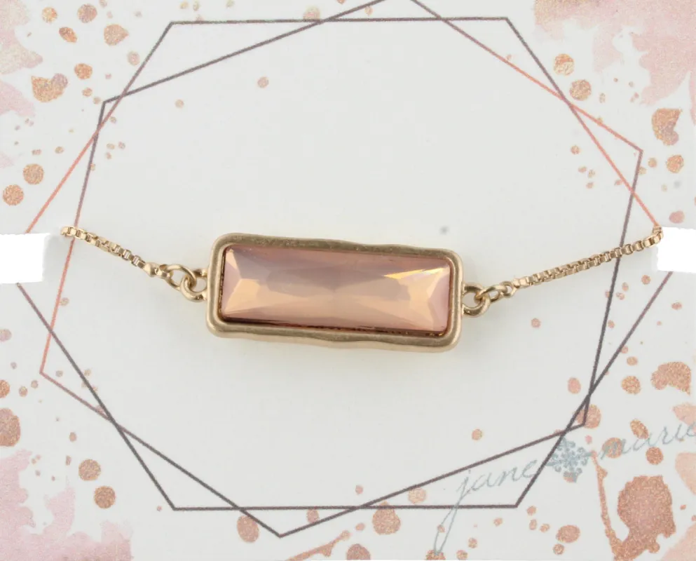 Gold Adjustable Chain Bracelet with Pink Rectangle Rhinestone sold by Charming Charlie