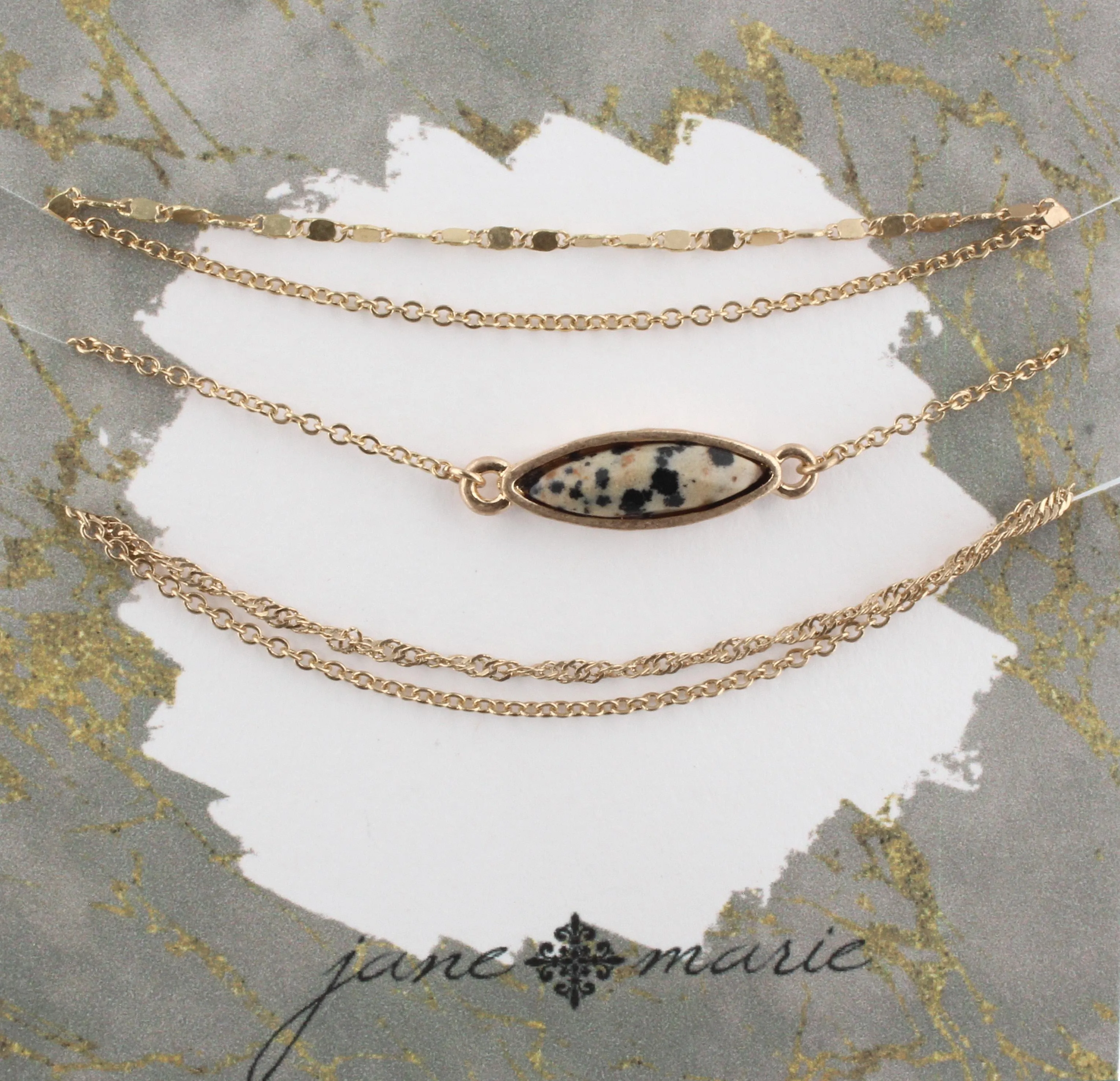 Gold Multi Strand Adjustable Bracelet with Dalmation Pointed Teardrop sold by Charming Charlie