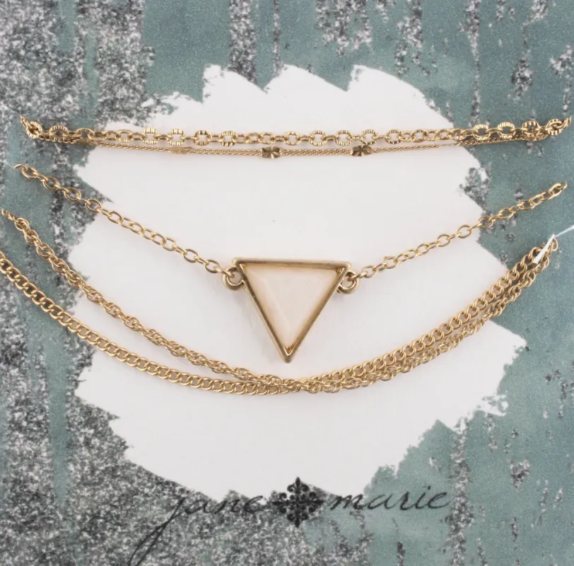 Gold Multi Strand Adjustable Bracelet with Ivory Triangle sold by Charming Charlie
