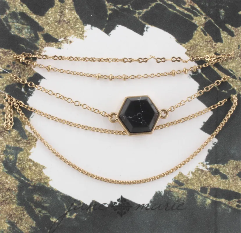 Gold Multi Strand Adjustable Bracelet with Jet Howlite Hexagon sold by Charming Charlie