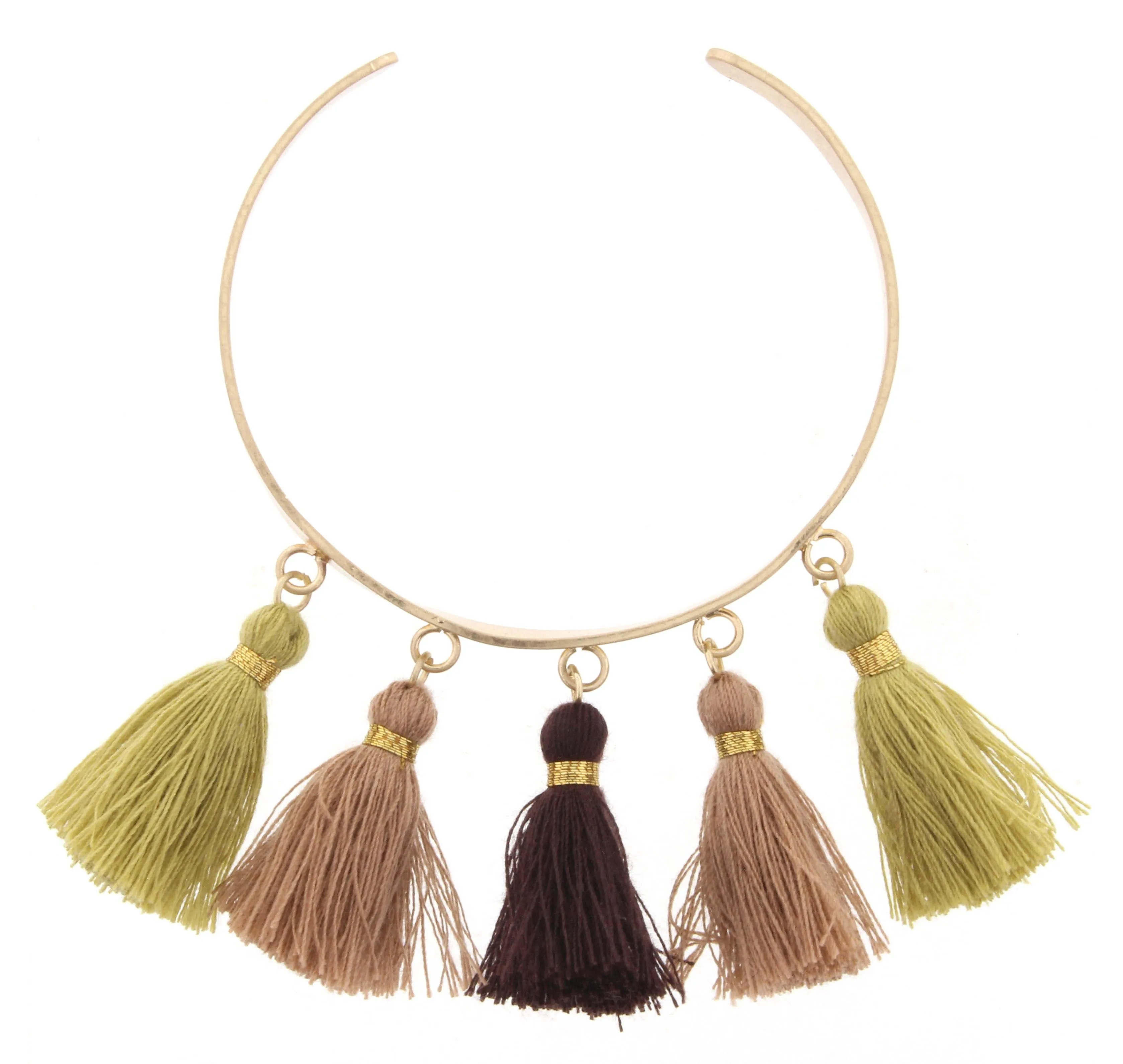 Gold Metal Cuff Bracelet with Dark Brown, Pear, and Light Brown Tassels sold by Charming Charlie