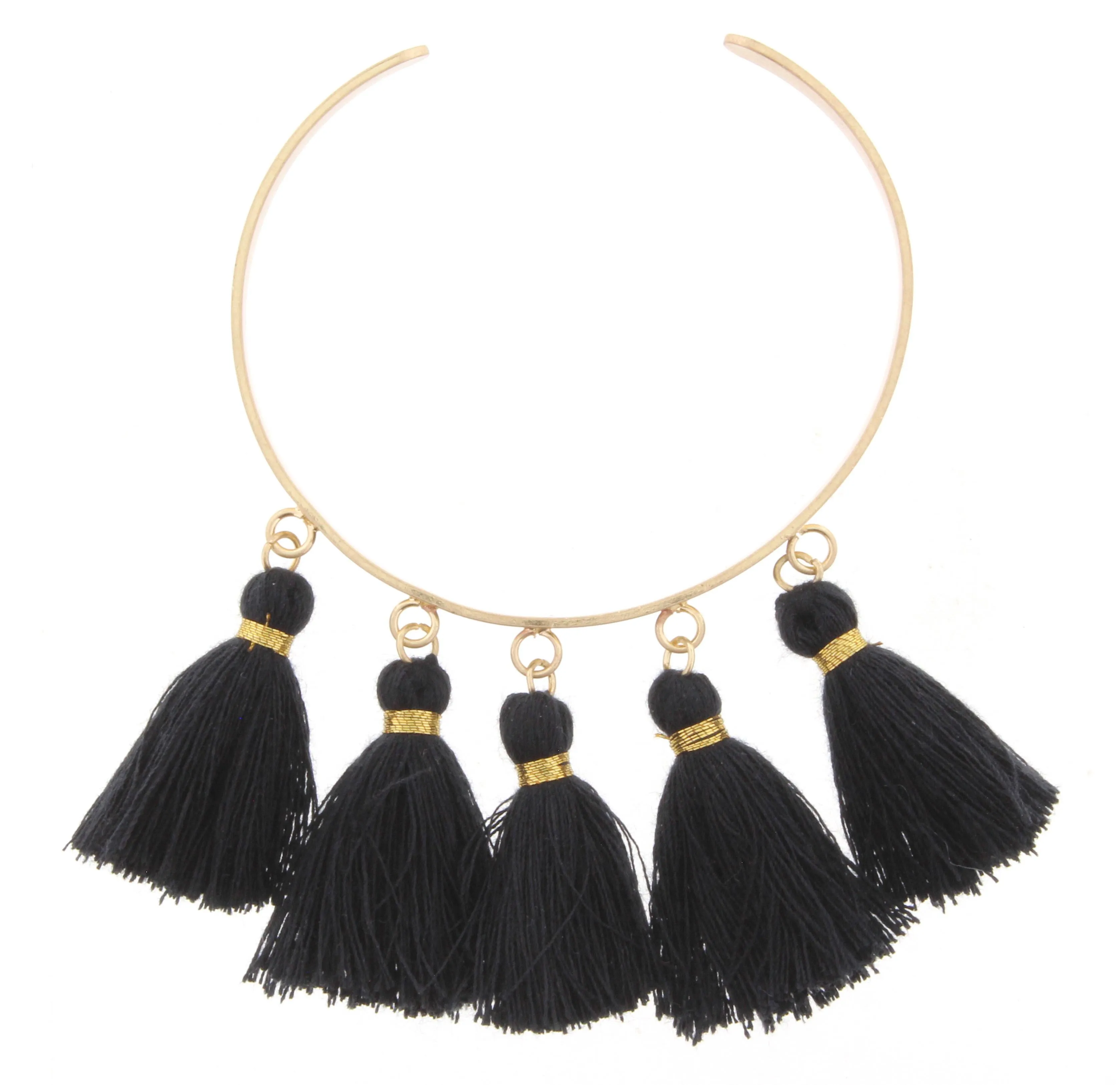 Gold Metal Cuff Bracelet with Jet Tassels sold by Charming Charlie