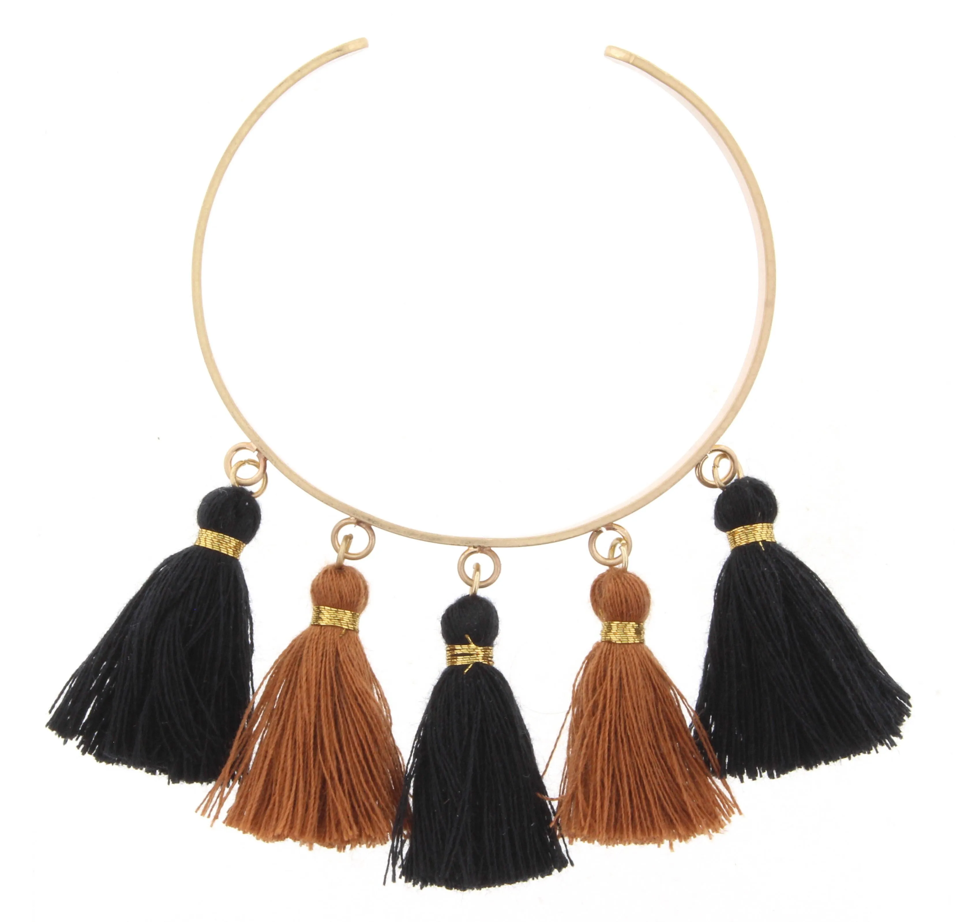 Gold Metal Cuff Bracelet with Jet and Brown Tassels sold by Charming Charlie
