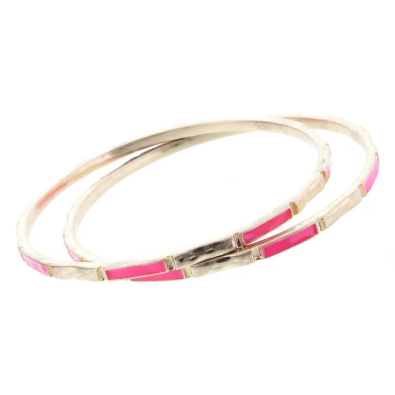 2 Blocked Off Gold BangleBracelets with Hot Pink Epoxy sold by Charming Charlie