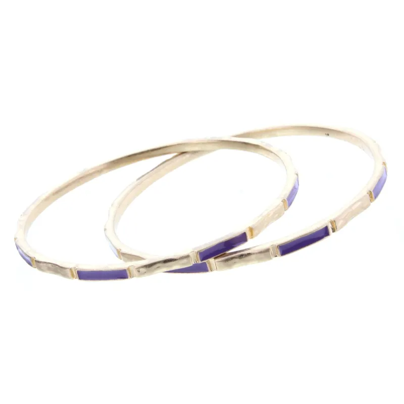 2 Blocked Off Gold Bangle Bracelets with Purple Epoxy sold by Charming Charlie