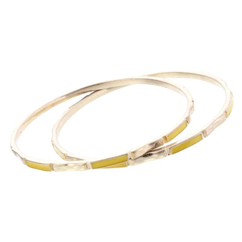 2 Blocked Off Gold Bangle Bracelets with Yellow Epoxy sold by Charming Charlie