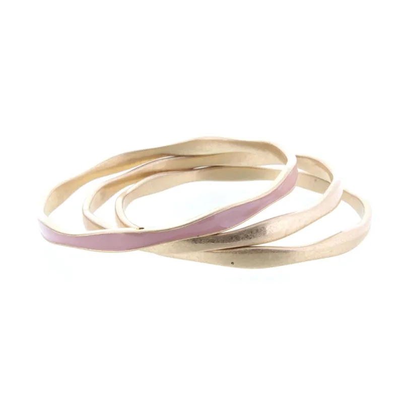 3 Gold Wavy Bangle Bracelets with One Mauve Epoxy Accent sold by Charming Charlie