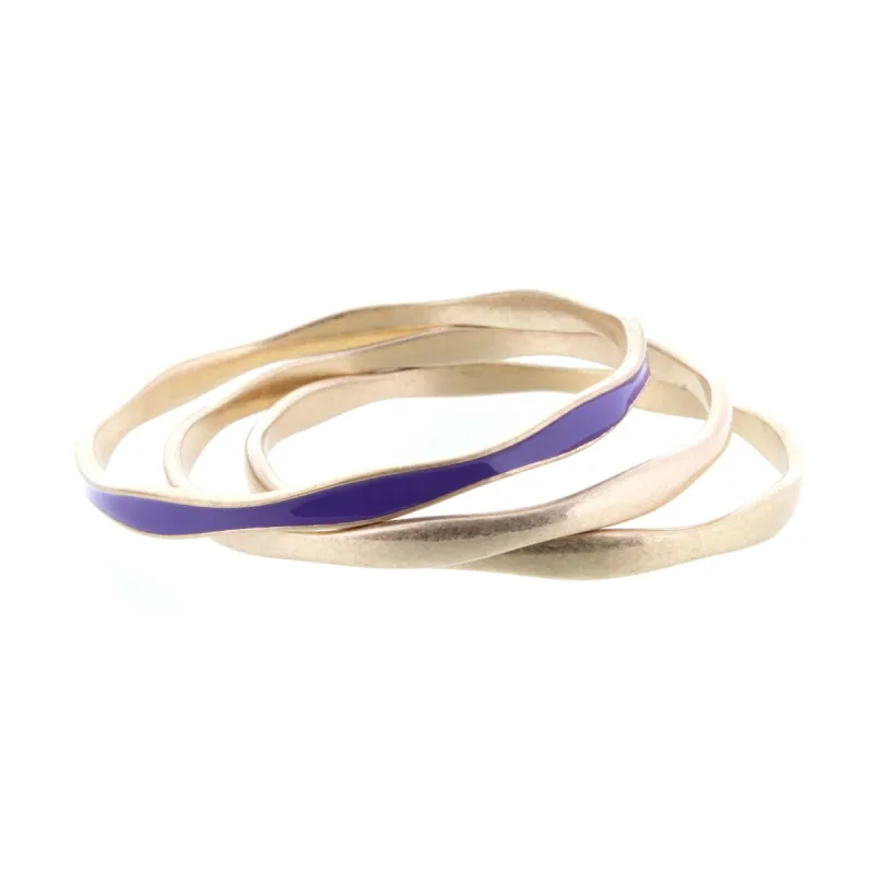 3 Gold Wavy Bangle Bracelets with One Purple Epoxy Accent sold by Charming Charlie