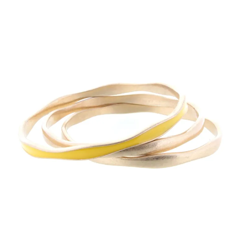 3 Gold Wavy Bangle Bracelets with One Yellow Epoxy Accent sold by Charming Charlie