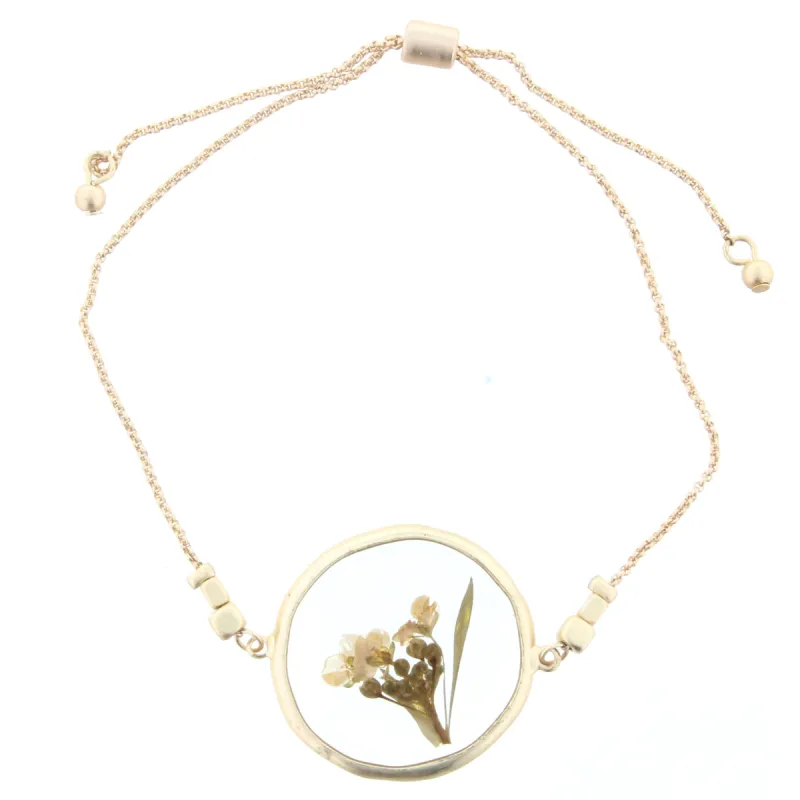 Adjustable Gold Bracelet with Pressed Cream Flowers in Resin Circle sold by Charming Charlie