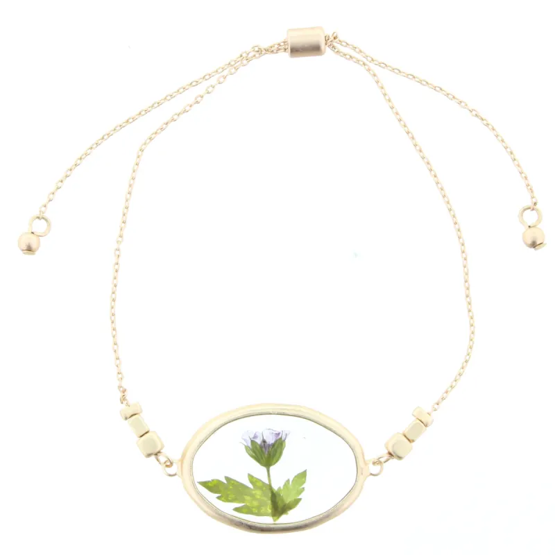Adjustable Gold Bracelet with Pressed Purple Flowers in Resin Oval sold by Charming Charlie
