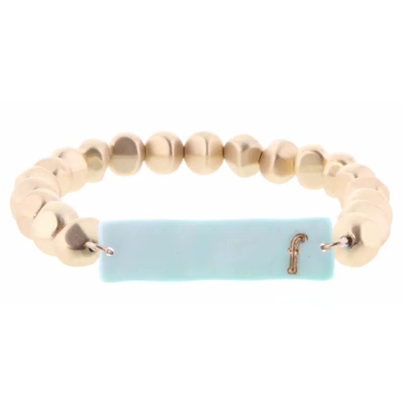 Gold Beaded Stretch, Mint Ceramic Rectangle with "F" Initial Bracelet sold by Charming Charlie