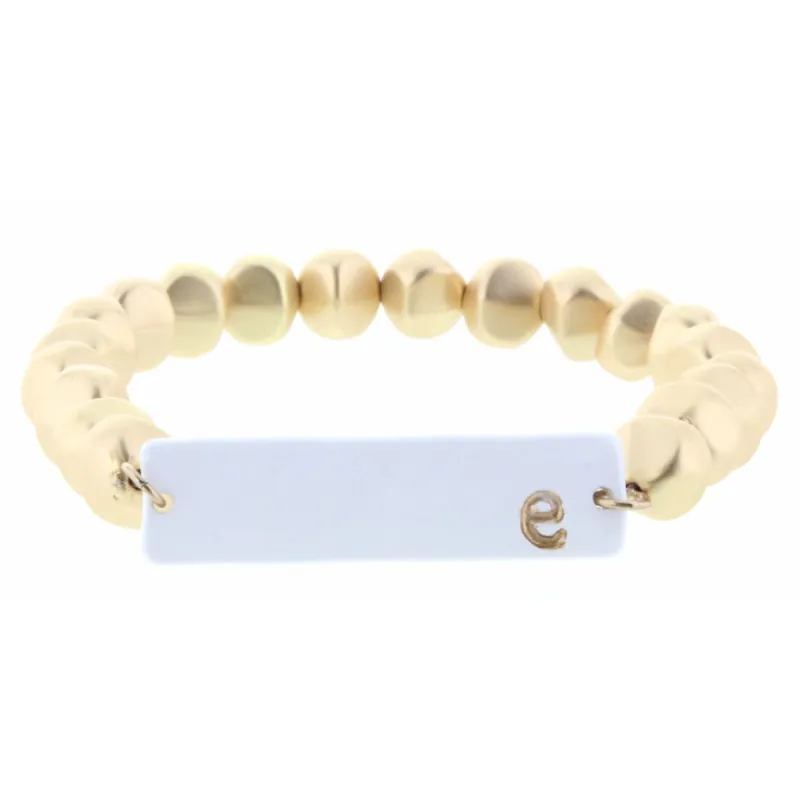 Gold Beaded Stretch, White Ceramic Rectangle with "E" Initial Bracelet sold by Charming Charlie