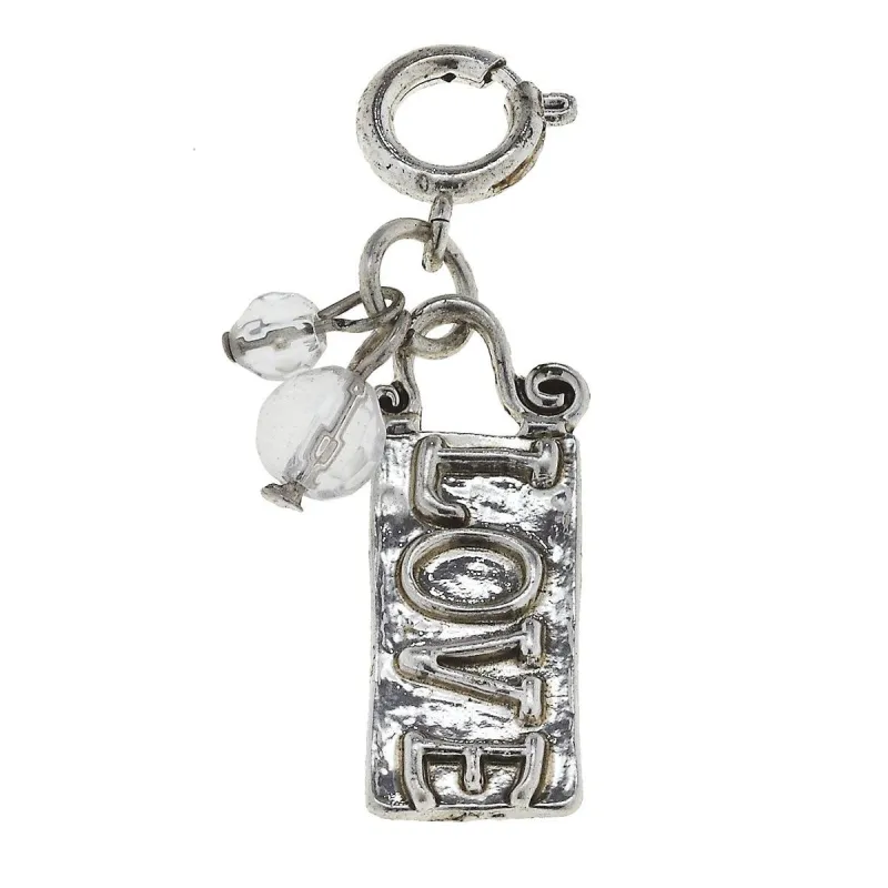 Antique Silver "Love" Artisan Phrase Charm sold by Charming Charlie
