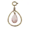Antique Gold Teardrop with Rose Teardrop Glass Charm sold by Charming Charlie