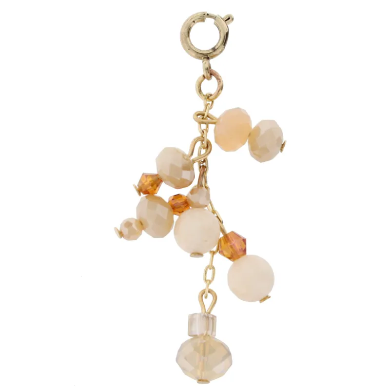 Antique Gold and Nude Dangle Charm sold by Charming Charlie