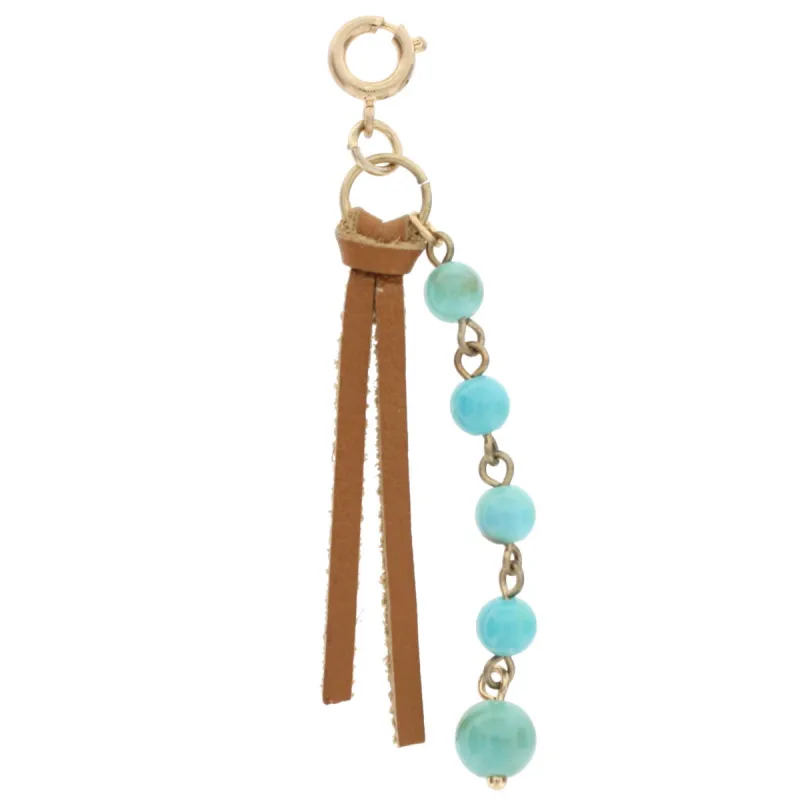 Light Brown Tassel and Turquoise Beaded String Charm sold by Charming Charlie