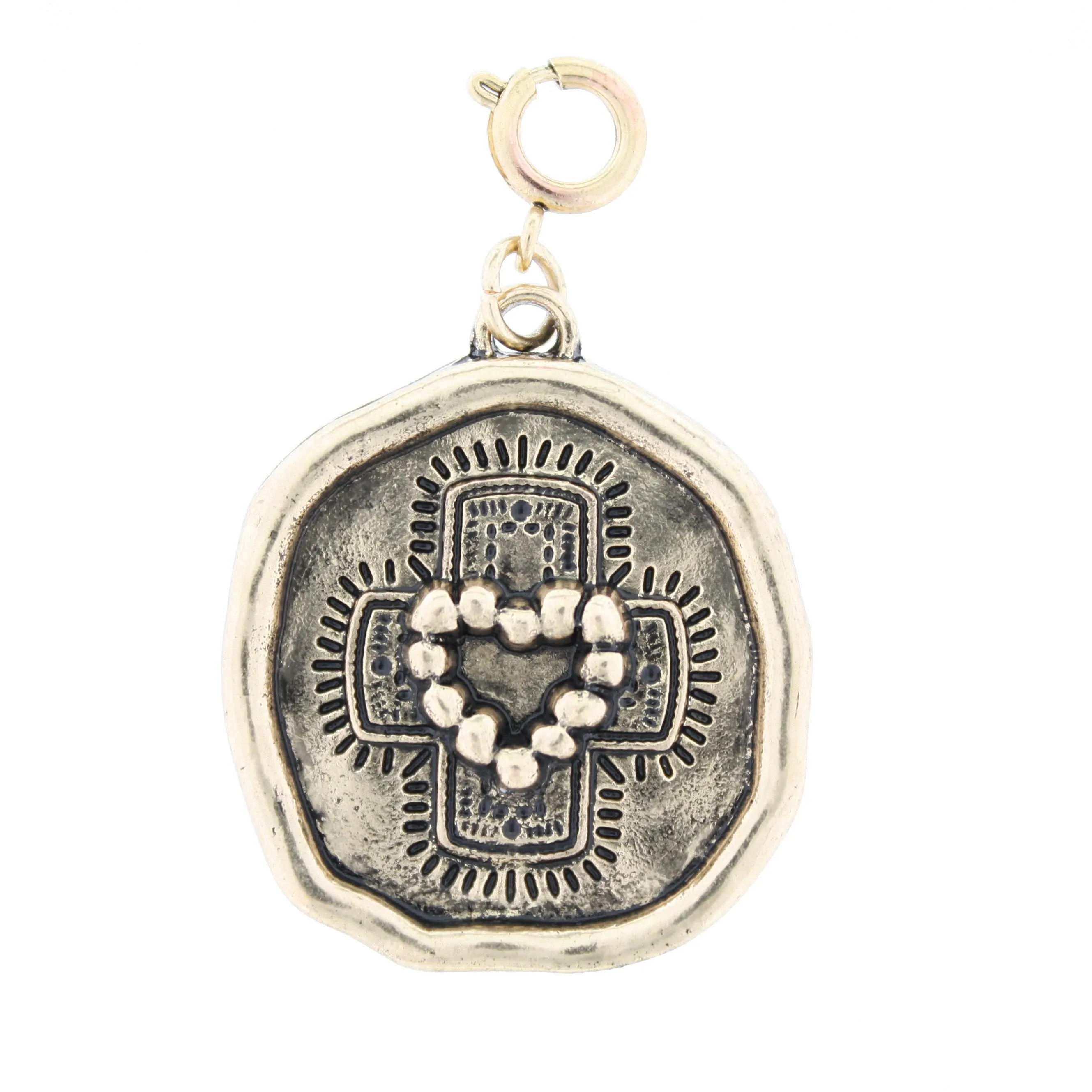 Gold Heart And Cross Charm sold by Charming Charlie