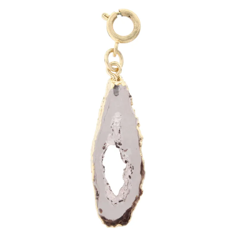 Gold Framed Amythyst Druzy Charm sold by Charming Charlie