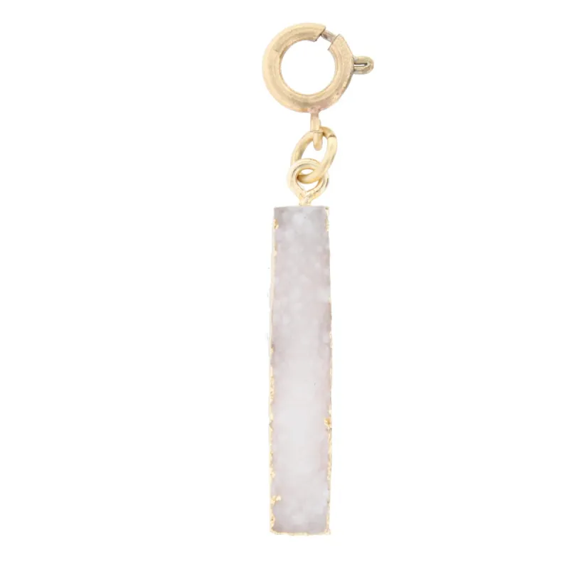 White Druzy Charm sold by Charming Charlie