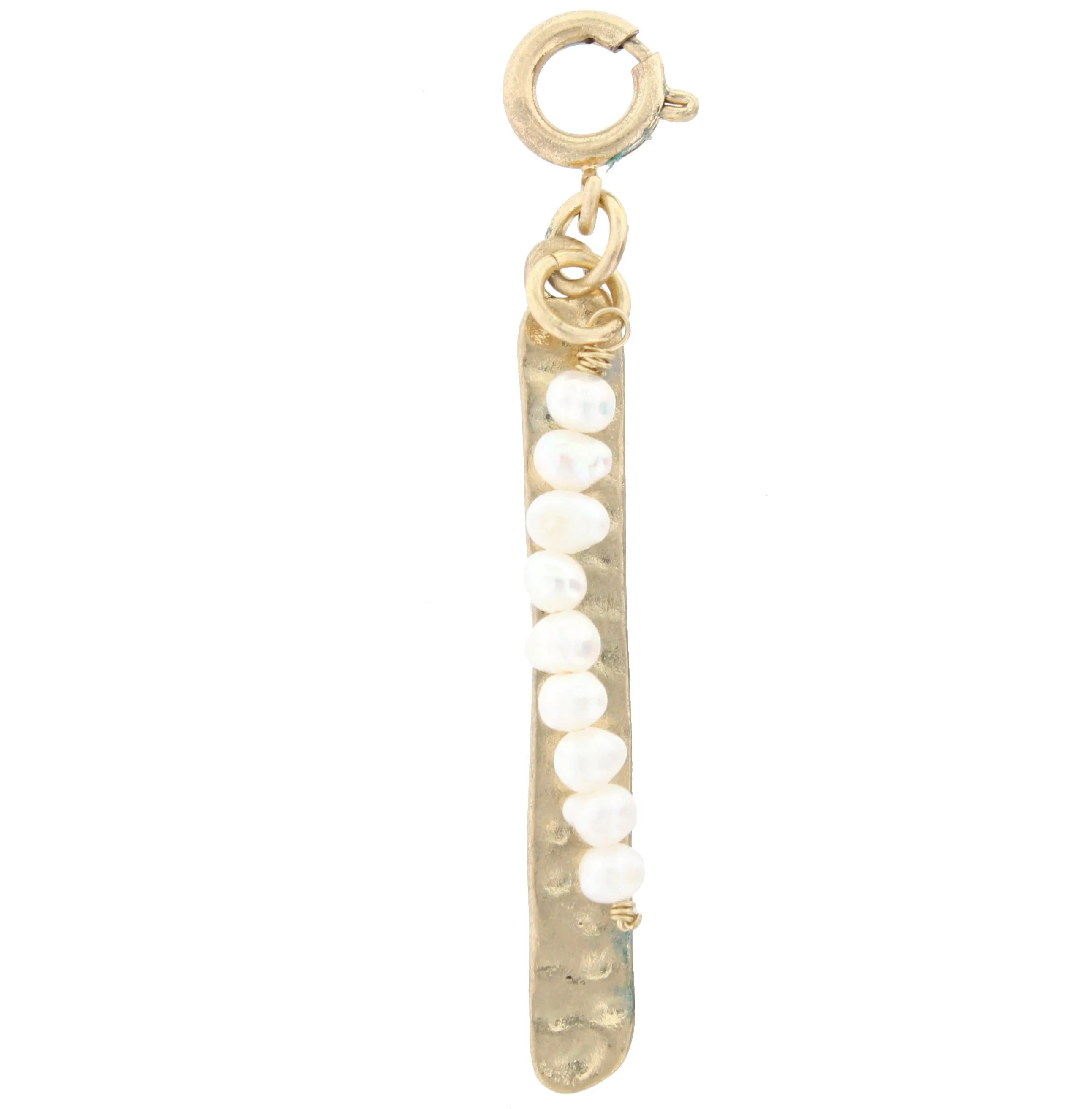 Ivory Bead with Gold Plate Charm sold by Charming Charlie