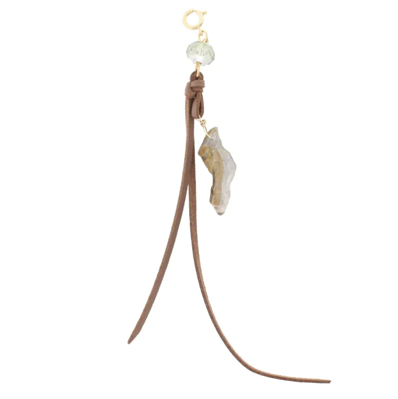Metallic Quartz with Light Brown Leather Tassel Charm sold by Charming Charlie