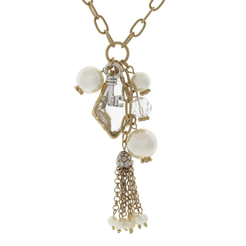 Chandelier and Charm Tassel Necklace - Key sold by Charming Charlie